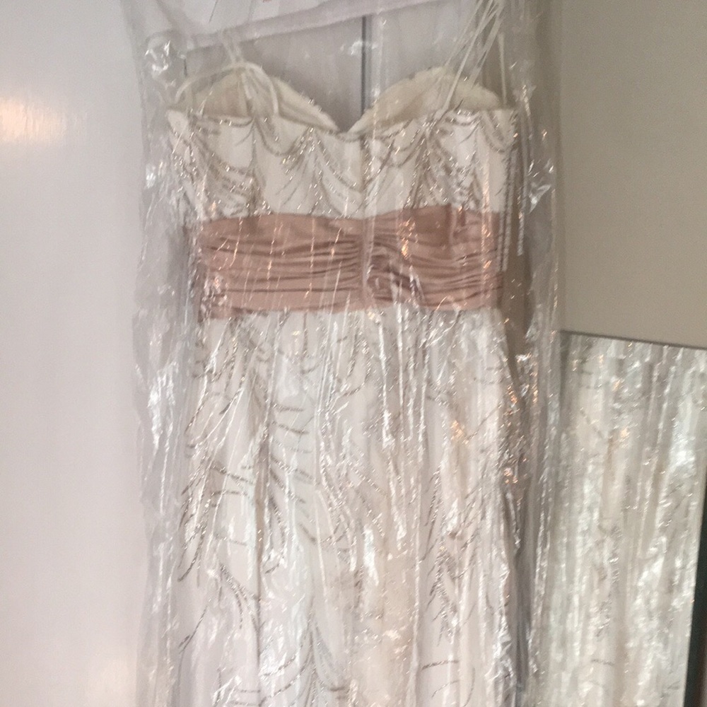 Creme full length prom Dress.